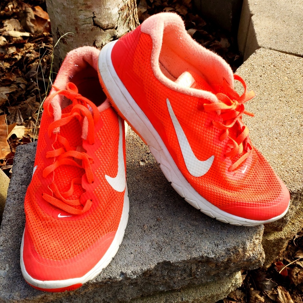 Neon orange Nikes womans size 7.5